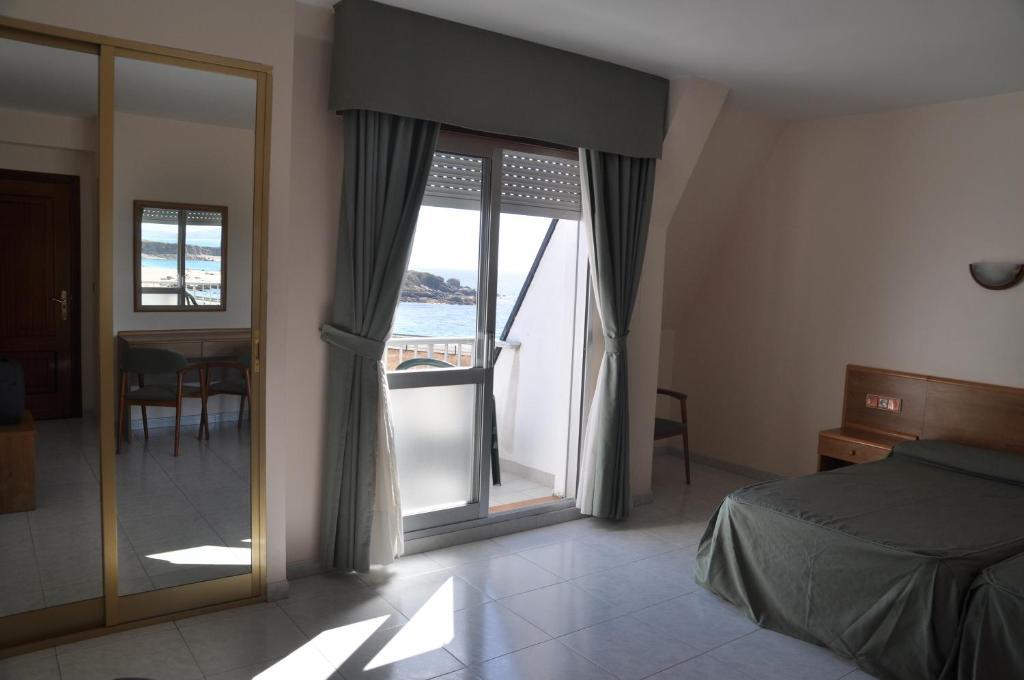 Hotel Paraimo Playa de la Lanzada Ruang foto